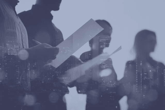 Business professionals reviewing documents